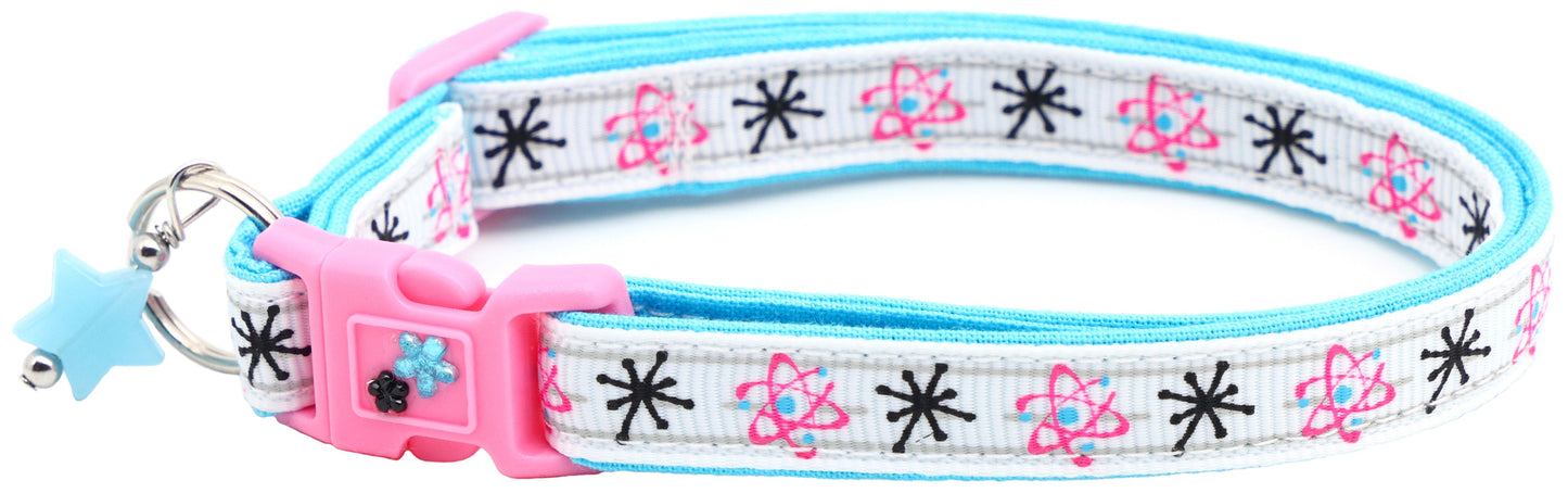 Atoms on White Cat Collar